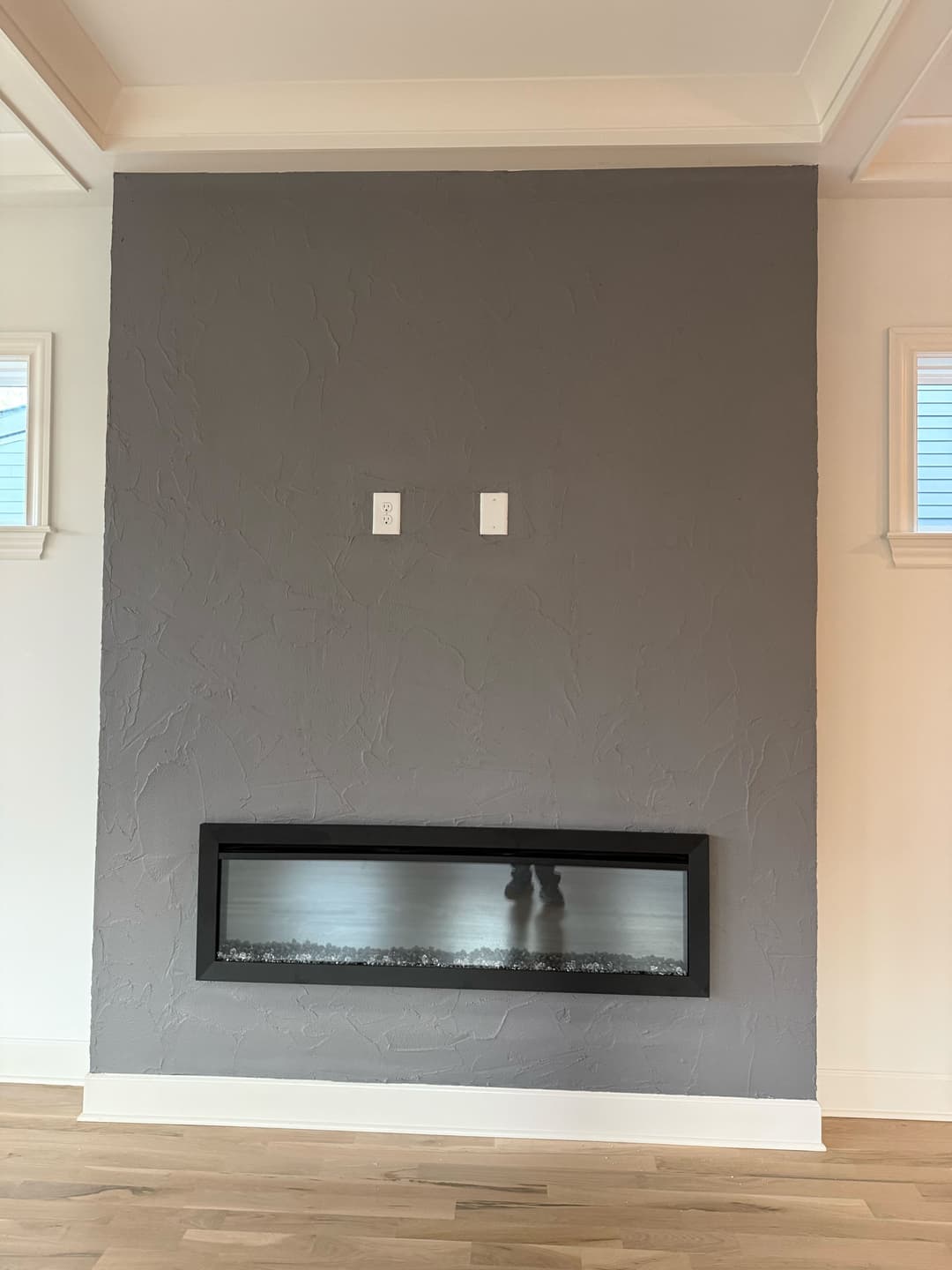 Limewashed fireplace feature wall in a living room on Litton Ave, Inglewood