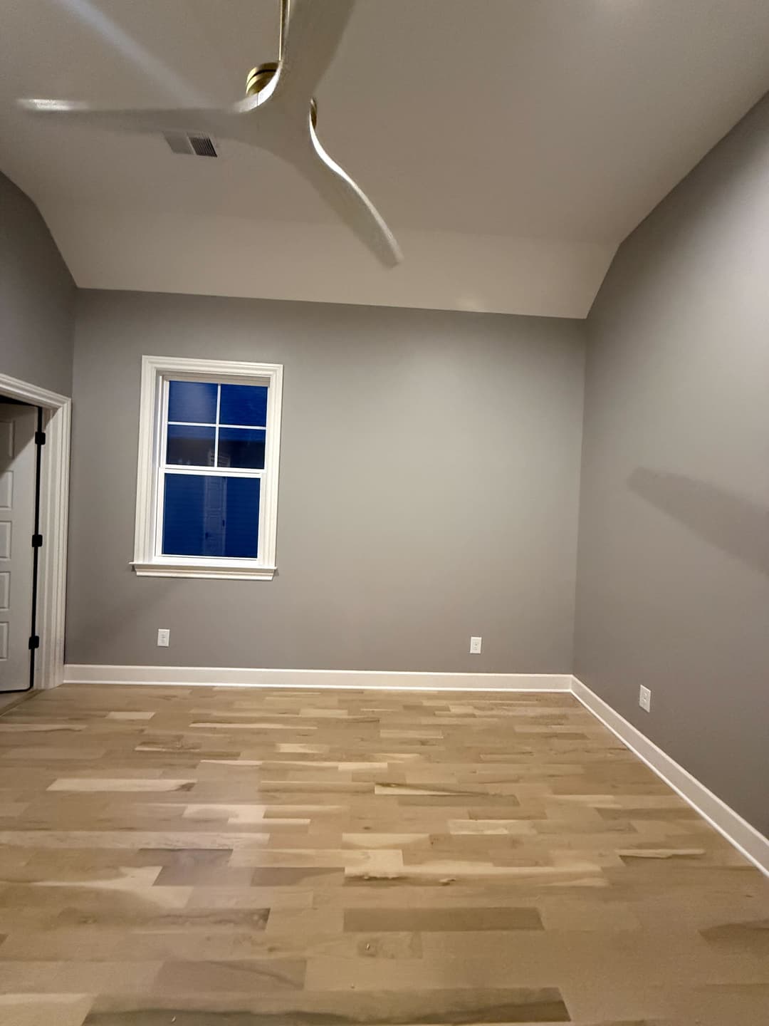 Grey bedroom with a vaulted ceiling and white trim, Litton Ave, Inglewood